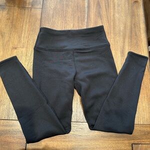 Women’s size small leggings, fur lined on the inside